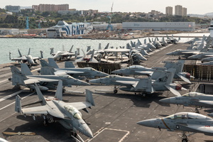 Super Hornets & Growlers stacked on the forward deck