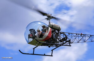 Fly over Whitman Field on a Bell 47G-2