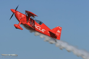 Sean Tucker tumbling over his Oracle Challenger III