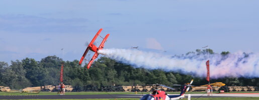 Sean Tucker tumbling over his Oracle Challenger III