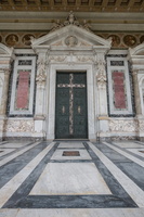 Main door depicting the life of Peter and Paul
