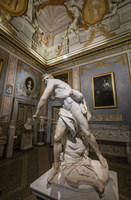 David by Bernini  in front of David and Goliath by Caraciollo in the background (17th AD)